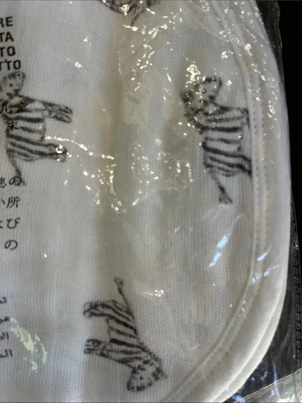 Organic Muslin Bibs (2) with elephants on one side and zebras on the other side